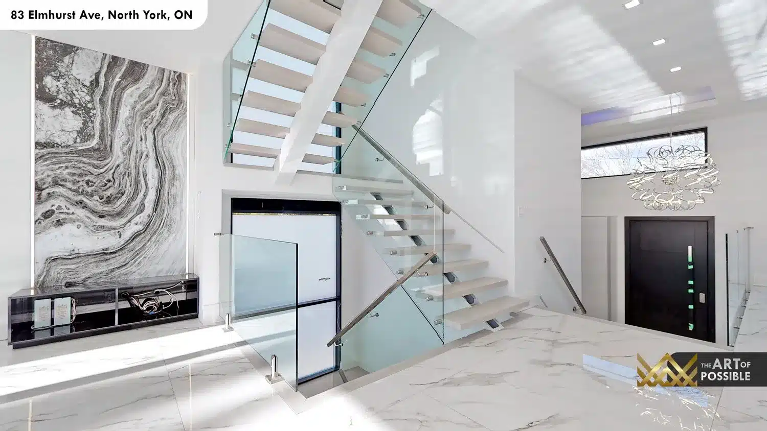 83 Elmhurst Ave North York foyer floating staircase glass railings marble floor chandelier